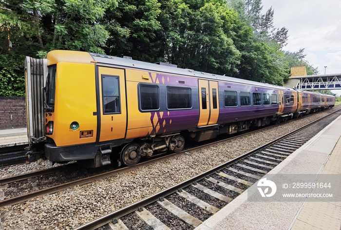 Passenger Diesel powered Train at platform England UK