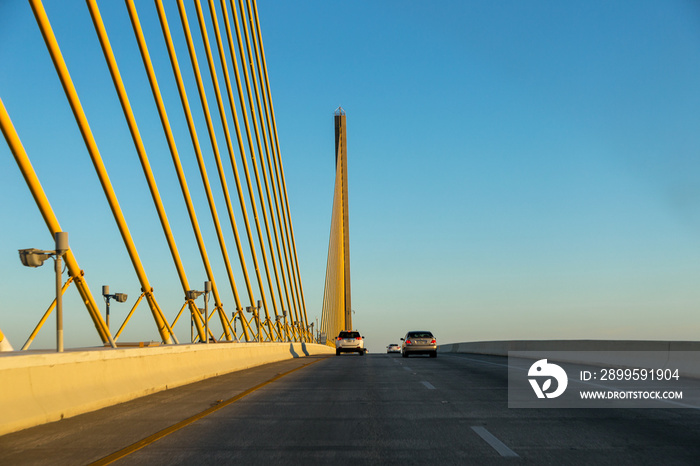 Driving through the Sunshine Skyway Bridge, Tampa Bay’s Signature Bridge, near the peak. Photographed with selective focus