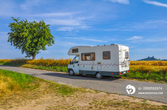 Cesky Raj, Bohemian Paradise, Trosky Castle, Caravaning, White kamper on a country road, Czech Republic