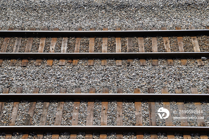 metal and wooden railroad tracks surrounded by gravel in Atlanta Georgia USA