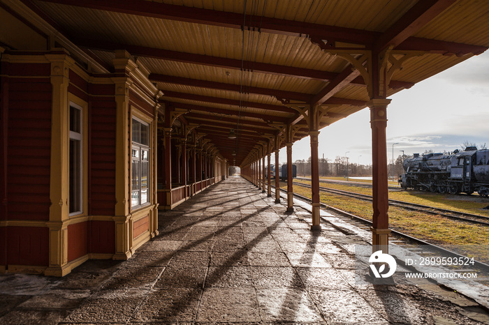 Old train station. Wooden wrok from last century, vintage style of Northern Europe.