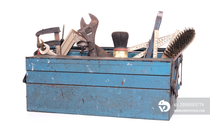 Old toolbox filled with vintage tools