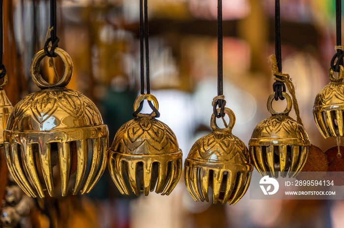 Small carillon and wind chimes made of copper, fake gold