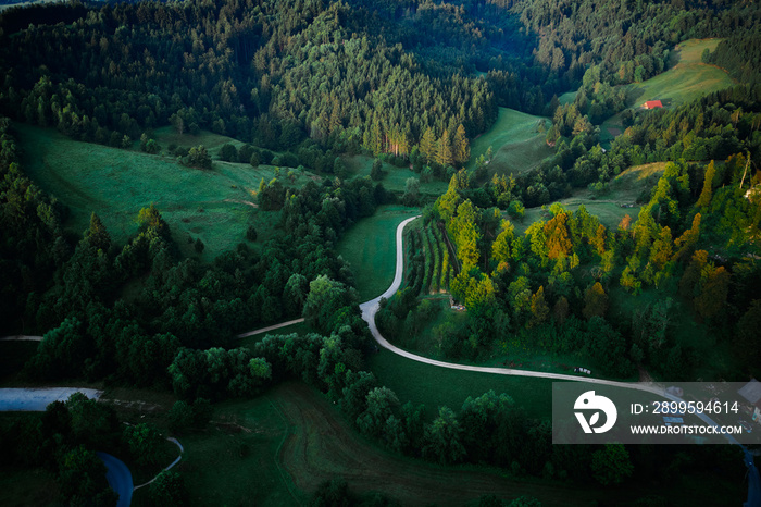 aerial shot of some road serpentines in Schnait, valley Remstal in Germany. countryside road.