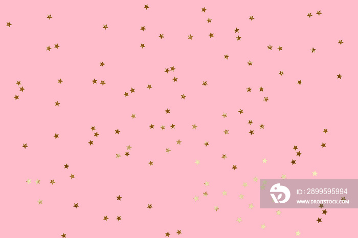 Falling confetti background. Sparkles on pink pastel trendy background. Festive backdrop for your projects.