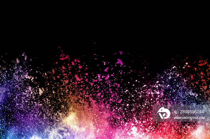 abstract colored dust explosion on a black background.abstract powder splatted background,Freeze motion of color powder exploding/throwing color powder, multicolored glitter texture.