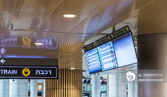 Electronic information stand for checking flights hangs from the ceiling in the lobby of Ben Gurion International Airport, near Tel Aviv in Israel