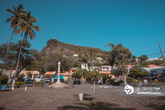 A monument in the main square of Velha, a suburb of Praia on Cabo Verde islands on a warm sunny autumn day.