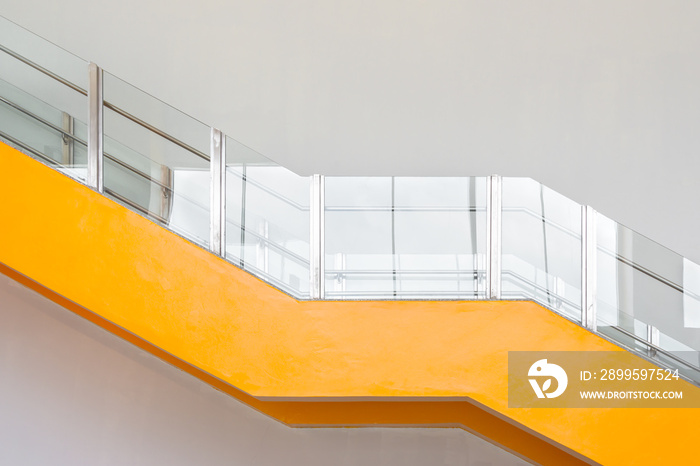 Stairway with metallic banister in a new modern building architecture