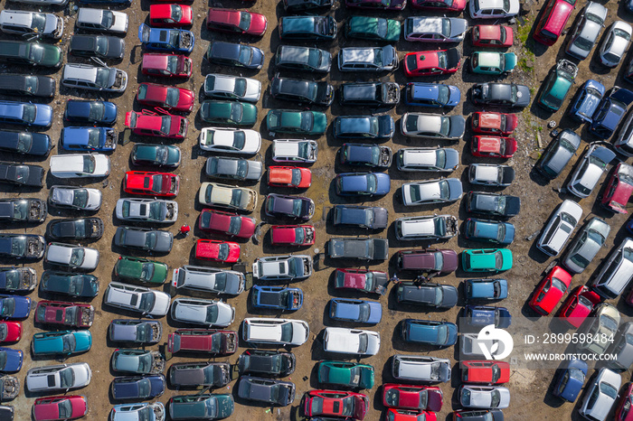 Scrapyard Aerial View. Old rusty corroded cars in car junkyard. Car recycling industry from above.