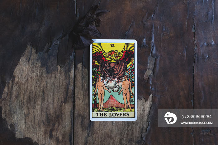 Tarot card on the old wood table