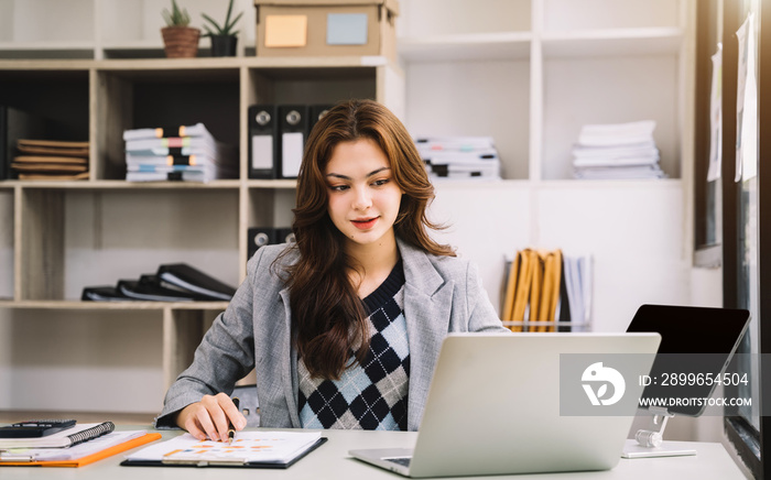 Business concepts, business people working in the work area with smartphones and data sheets at the 