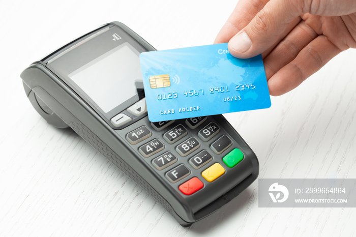 Contactless payment by credit card. POS terminal NFC payment. Concept of how to choose payment metho