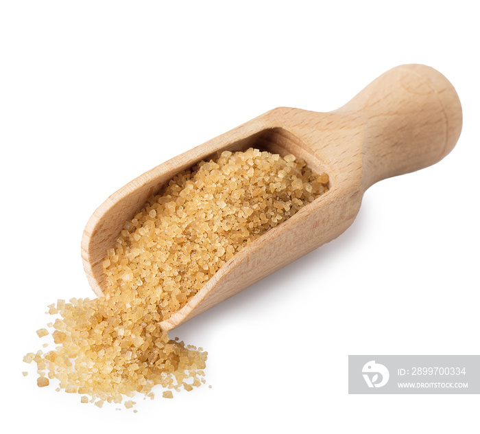 brown cane sugar in wooden scoop