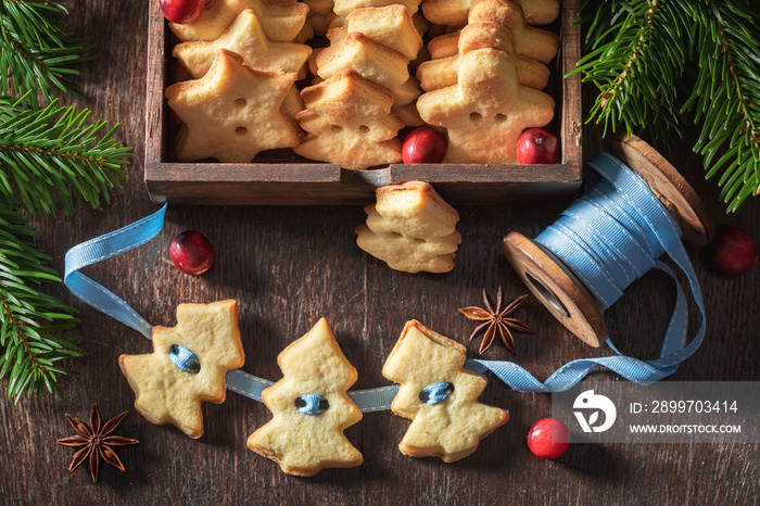 Top view of Christmas chain made of butter cookies