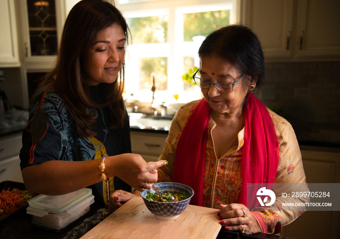 Mother-Daughter cooking together