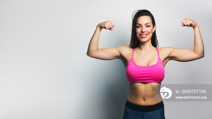 Beautiful fitness girl posing