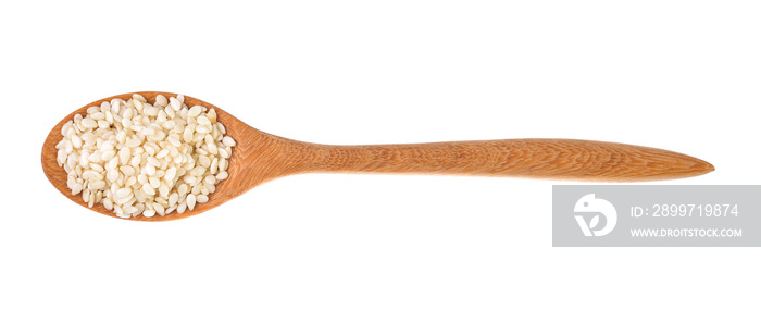 Sesame seeds on a wooden spoon as a white background.