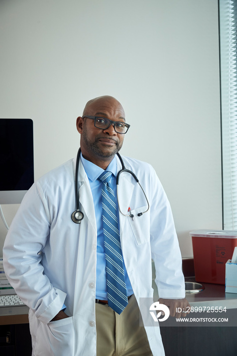 Doctor posing in medical office