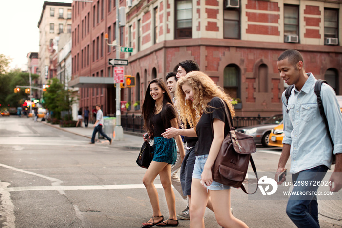 Friends walking in city