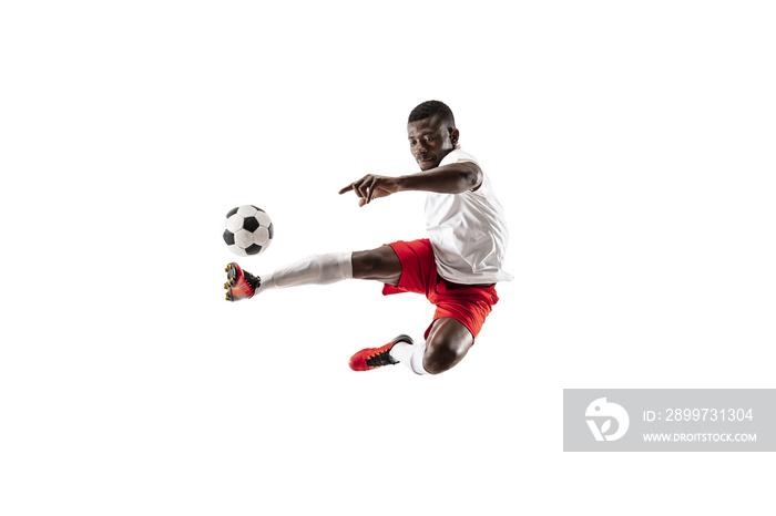 Professional african american football soccer player in motion isolated on white studio background. 