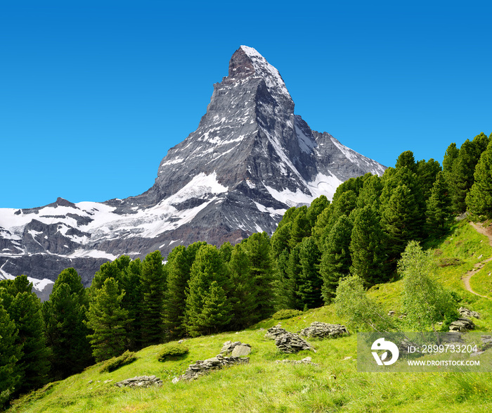 Beautiful mountain landscape with views of the Matterhorn peak in Pennine alps, Switzerland.
