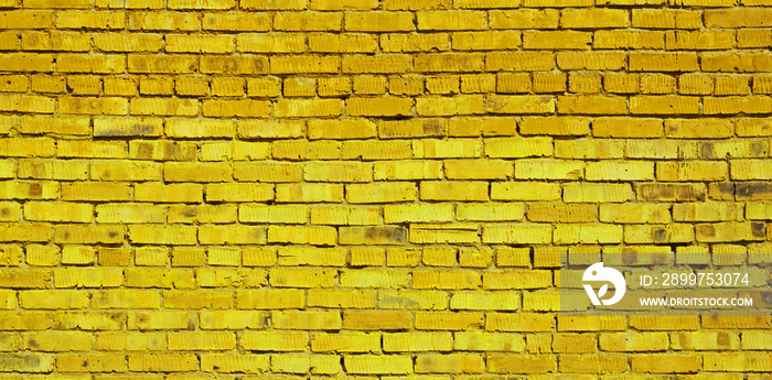 黄色砖墙背景，砖的纹理