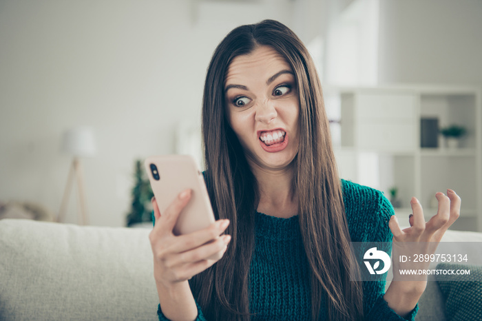 Close-up photo portrait of grimacing funny facial expression grinning teeth mad she her student hold