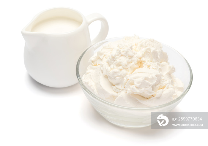 Traditional Mascarpone cheese and cream or milk isolated with clipping path