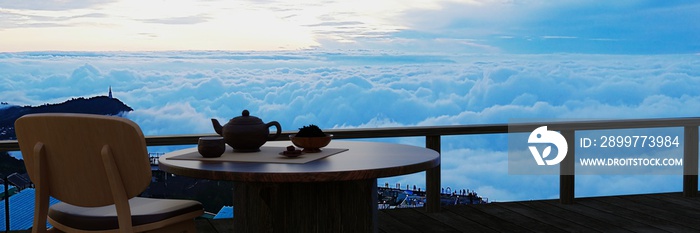阳台或露台上木制桌椅上的陶瓷茶具和干茶叶