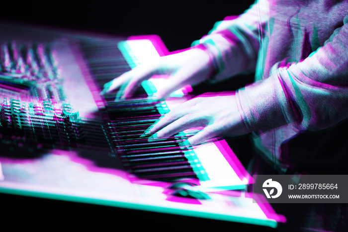 Piano player on concert stage.Professional pianist playing live music set in night club with digital