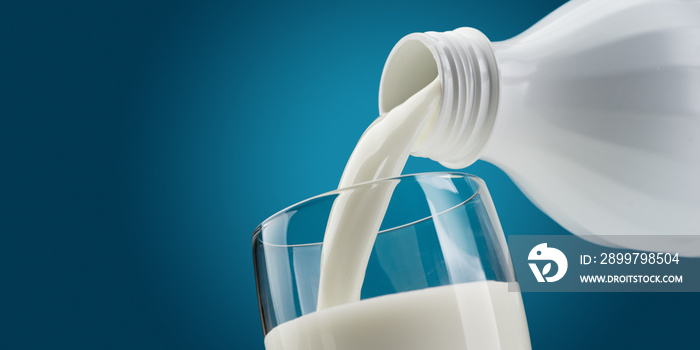 Pouring fresh milk into a glass