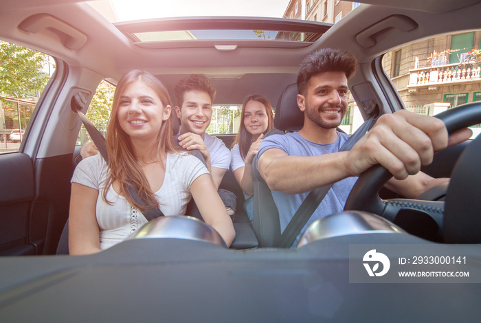 Group of friends on a car