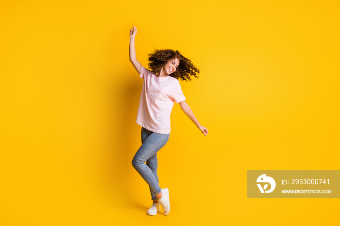 Photo portrait full length of woman dancing isolated on vivid yellow colored background