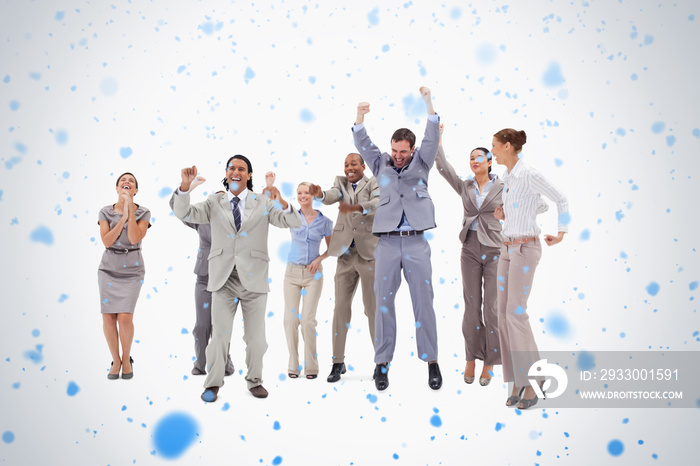 Very enthusiast people jumping and raising their arms against snow falling