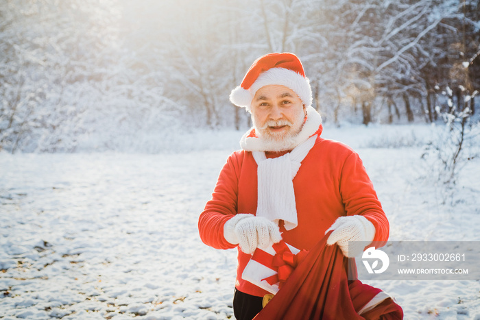 Thanksgiving day and Christmas. Merry Christmas and Happy New Year concept. Merry Christmas and Happy new year. Santa Claus with a huge bag.