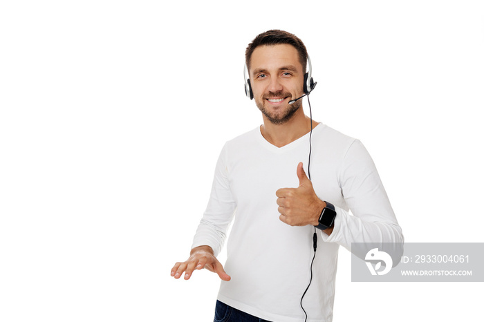 Call center worker man isolated on white background. Young smiling employee telesales agent using headset and showing Ok sign