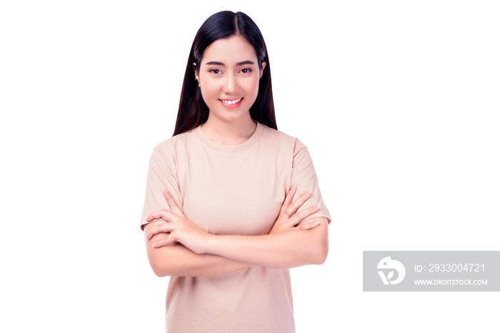 Happy young asian girl hold hands crossed toothy smiling Pretty young woman get happy and friendly smiling Beautiful woman looking camera and imaginary to copy space with crossed arm Isolated