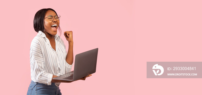 African American Girl Holding Laptop Gesturing Yes, Pink Background, Panorama