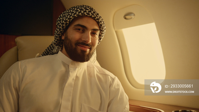 Successful arabian looking camera on luxury flight portrait. Oil company owner