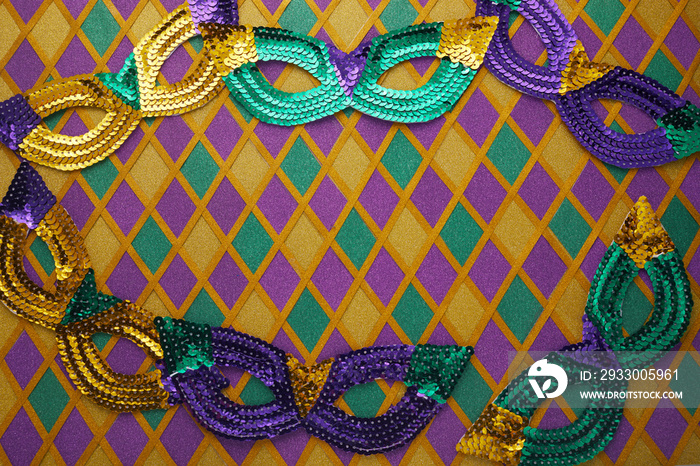 Frame of Mardi Gras Mask on diamond shaped background