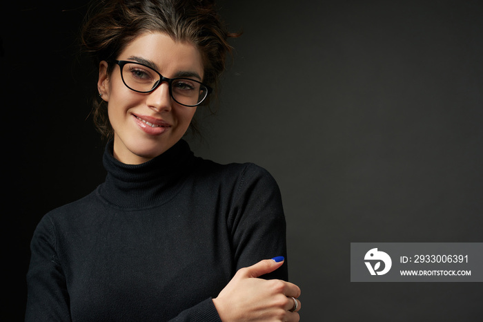 business fashion girl with glasses  on dark gray background