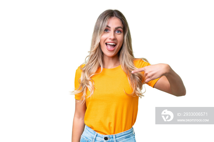 Young Uruguayan woman over isolated background with surprise facial expression