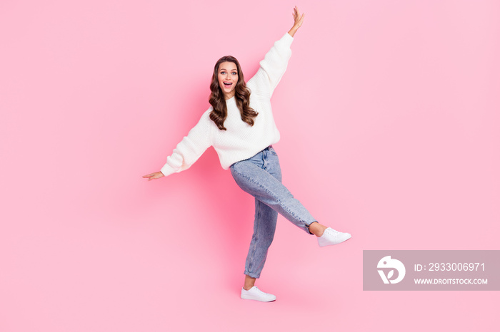 Full length photo of carefree funny woman dressed white pullover having fun isolated pink color background