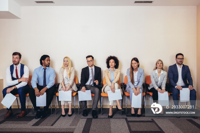 Photo of candidates waiting for a job interview. Selective focus