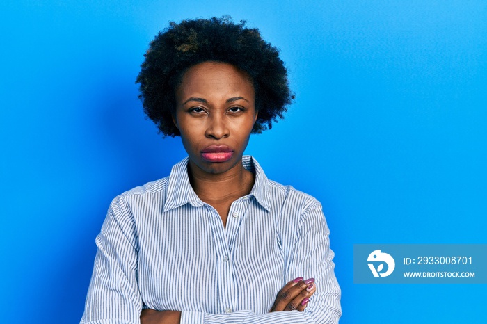 Young african american woman wearing casual clothes skeptic and nervous, disapproving expression on face with crossed arms. negative person.