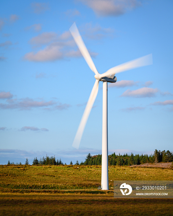 Single Wind Turbine with motion blur, at Green Rigg 18 turbine onshore Wind Farm located near Sweethope Loughs in Northumberland, England