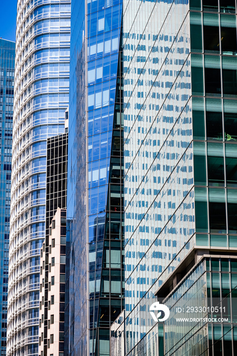 Modern skyscrapers and high rises built close to one another in downtown San Francisco; banking, finance and business background