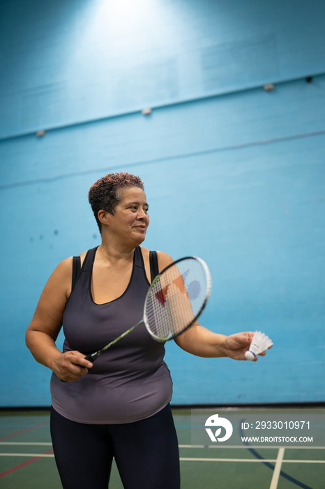 Woman playing badminton