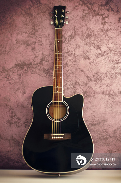 black acoustic guitar